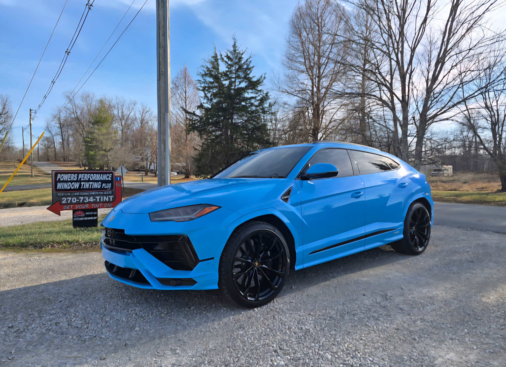 Blue car with professional window tint